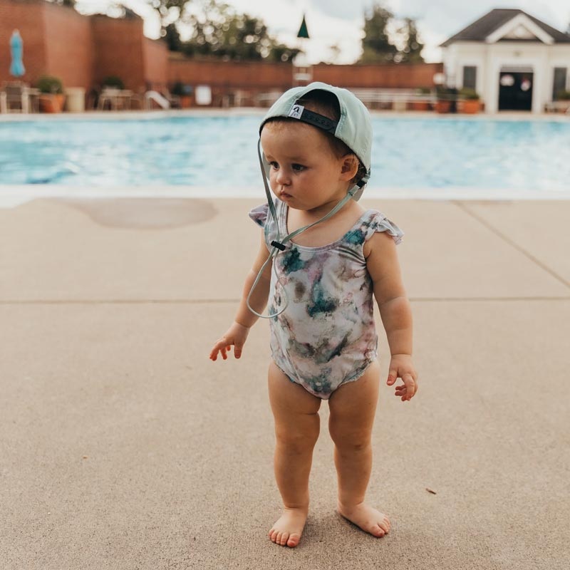 Current Tyed Ruffle Shoulder One Piece – The River (Tie Dye) *CLEARANCE* 0-6m